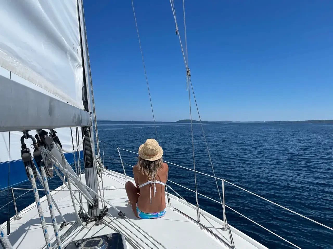 A group of people celebrating with wine glasses raised in a toast.