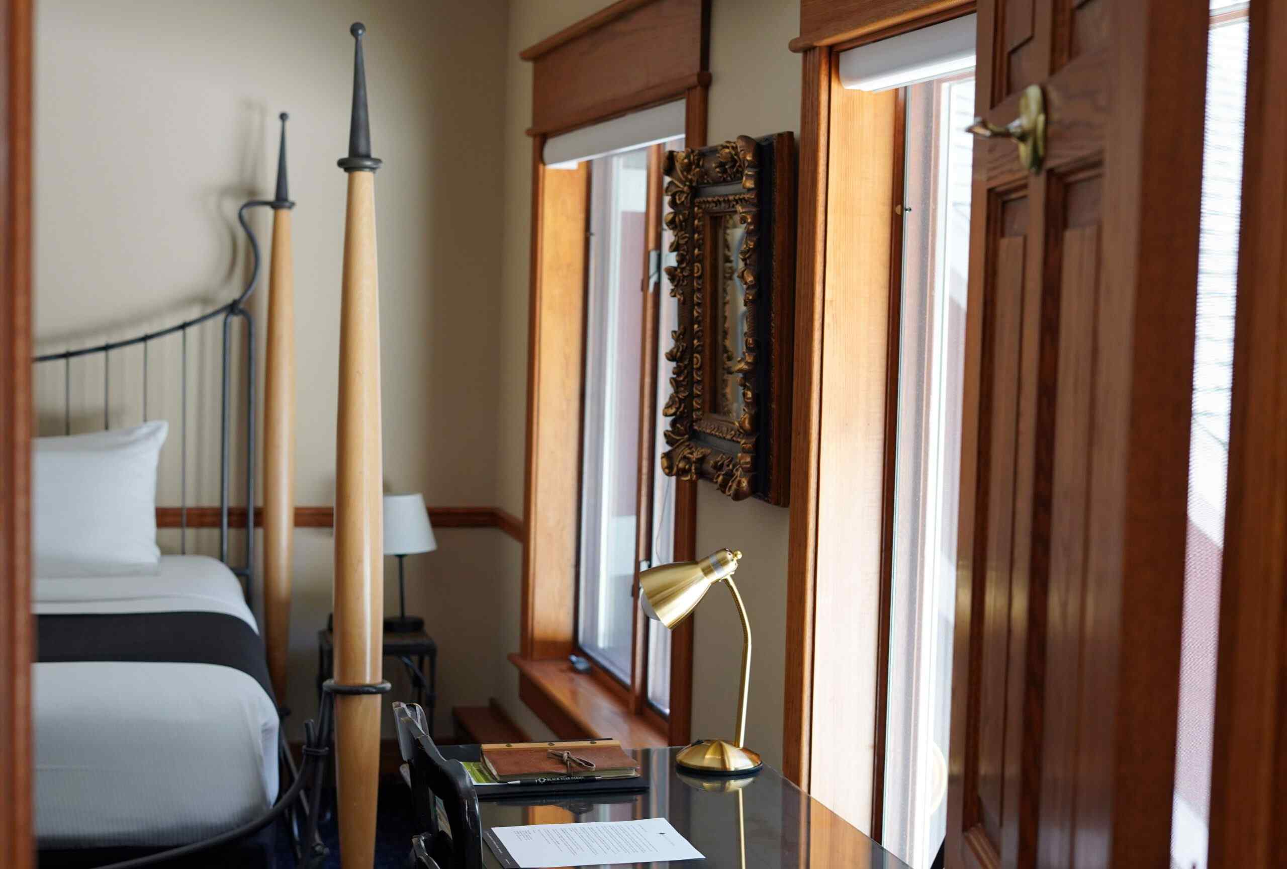 A modern bathroom featuring a glass shower door and a sink.