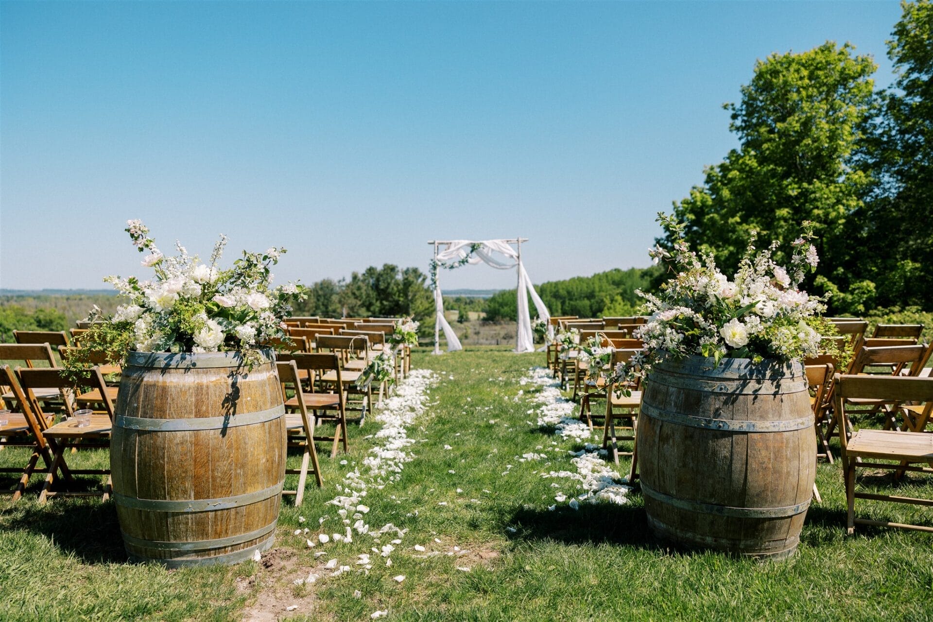 Vineyard wedding overlooking Grand Traverse Bay at Black Star Farms near Traverse City