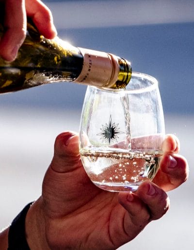 Bottle of wine with glass