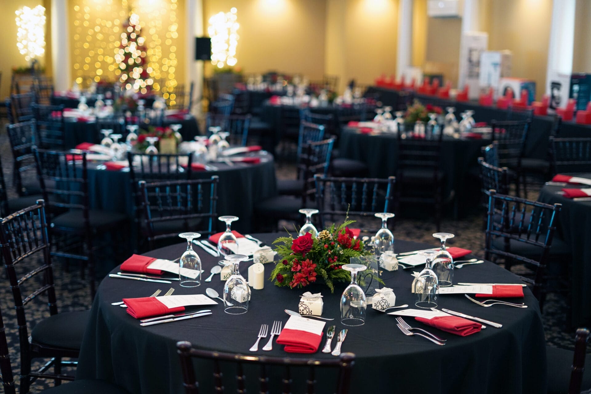 Holiday party dinner setup in large event space