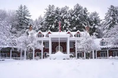 A whimsical winter photo of the Inn at a winery